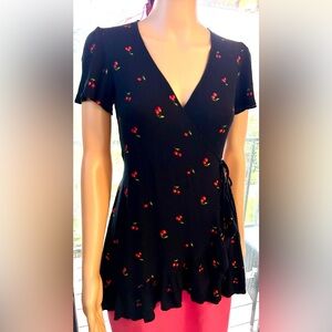 Solemio, Las Angeles. Black, wrap top with cherry print. Sz. S women’s